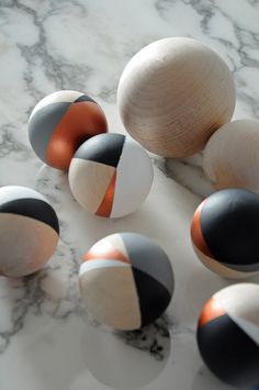 "Here's some I made earlier." Hand painted wooden balls/baubles by obsessilicious