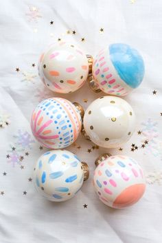 Hand painted baubles for christmas decoration. Full of pastel colors. A great DIY project